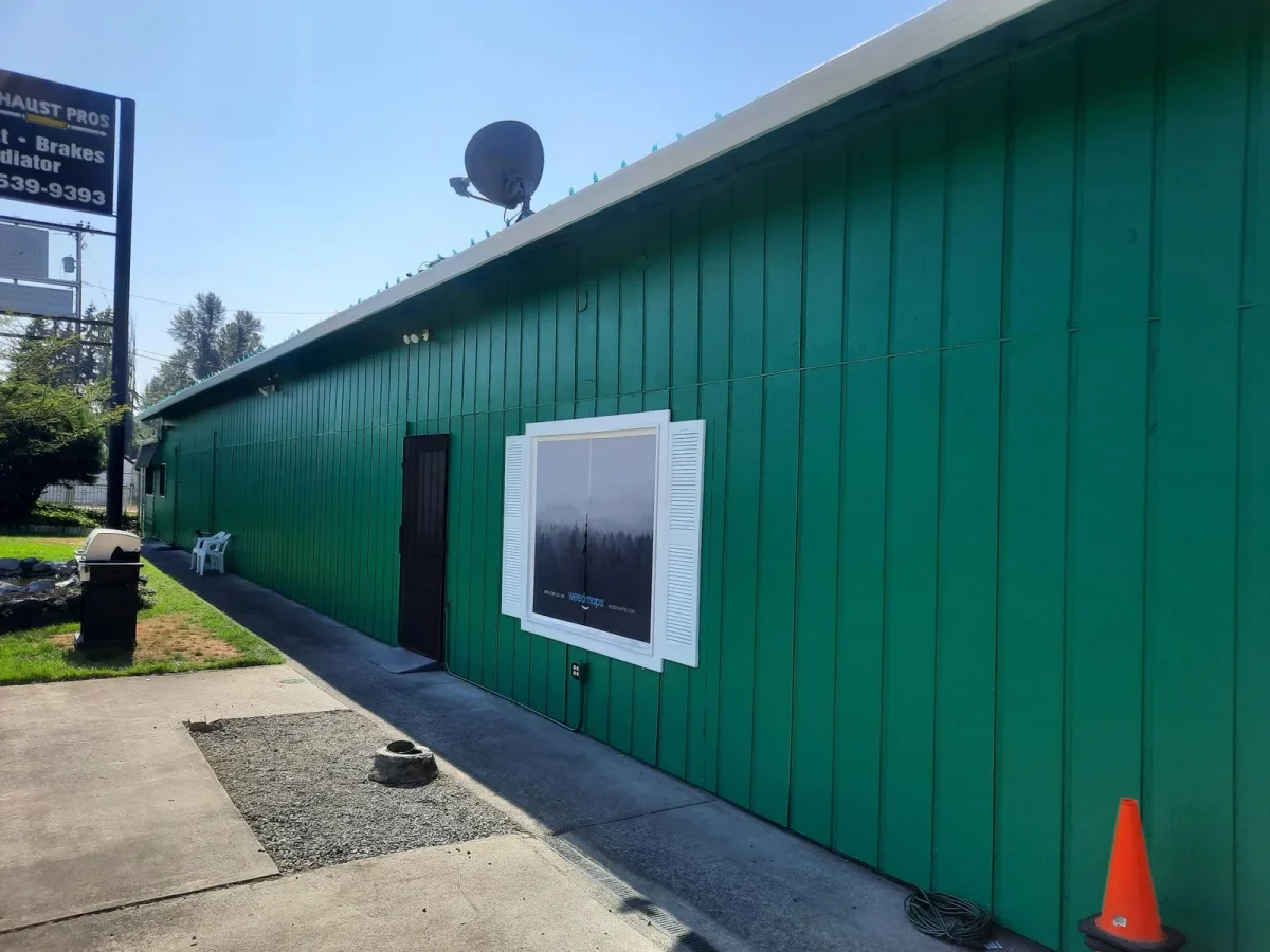 Green painted exterior siding at NW Cannabis Connection in Puyallup, shown in LLN’s homepage gallery